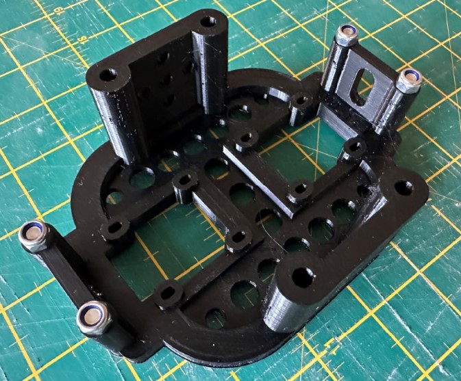 Prototype 3d printed part. This is a twin camera cradle idea. When connected to a Raspberry Pi 5 the telescope could support 2 cameras, each one optimised for different purposes.